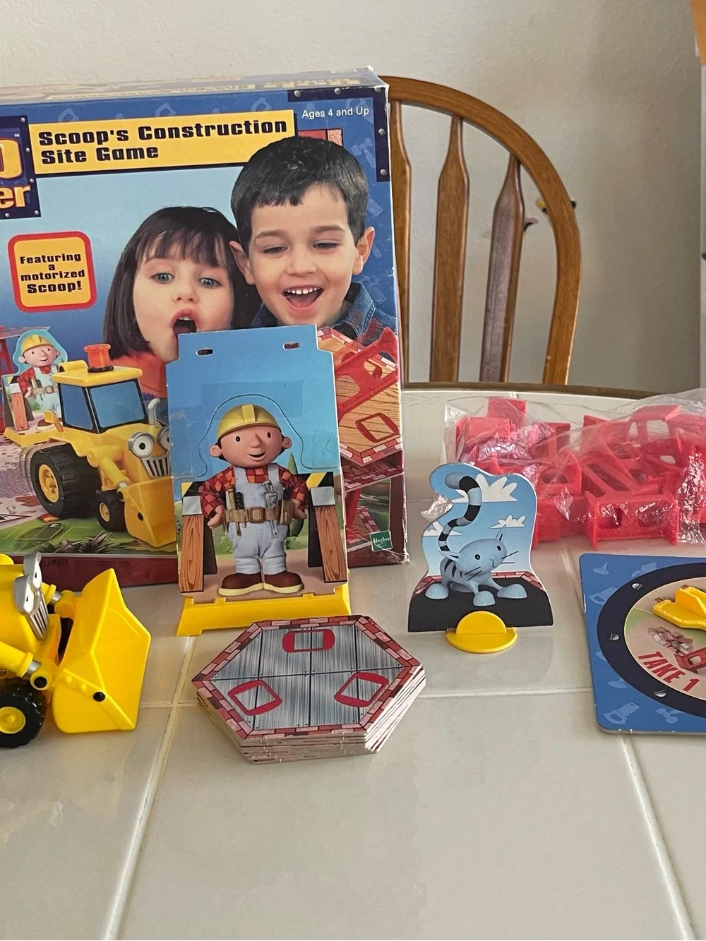 MBMilton Bradley scoop construction